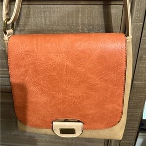 Shoulder strap. Coral & tan color. Seven openings. Used once. 9x9x1 1/2 “ wide.